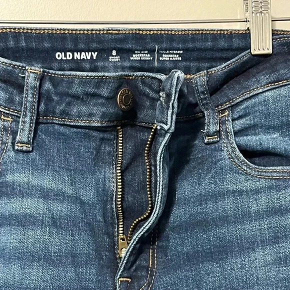 Old Navy Mid Rise Rockstar Super Skinny Short Dark Wash Jeans - Picture 5 of 10